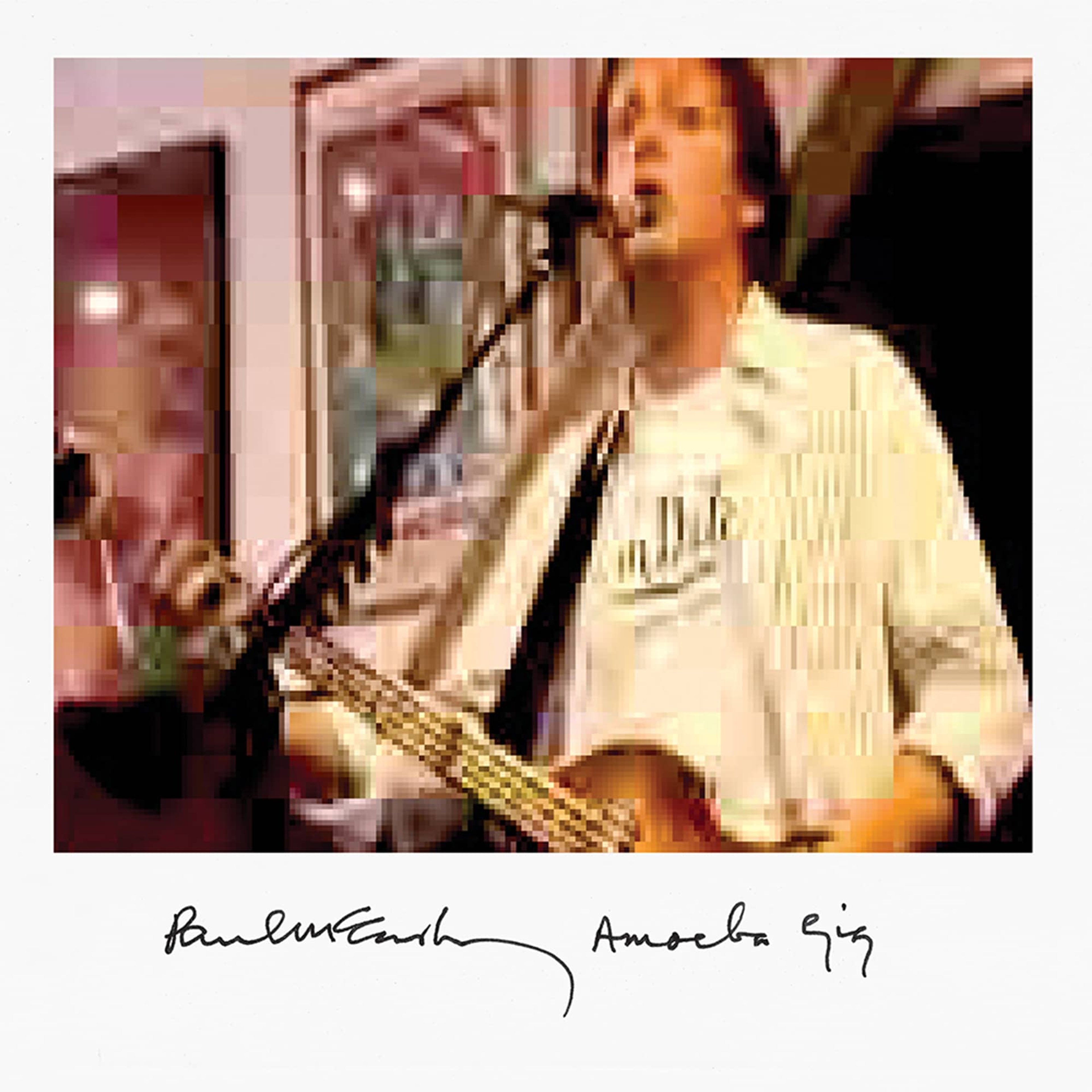Amoeba Gig album cover features Paul's handwritten name and album logo plus a photo of him at the 2007 show.