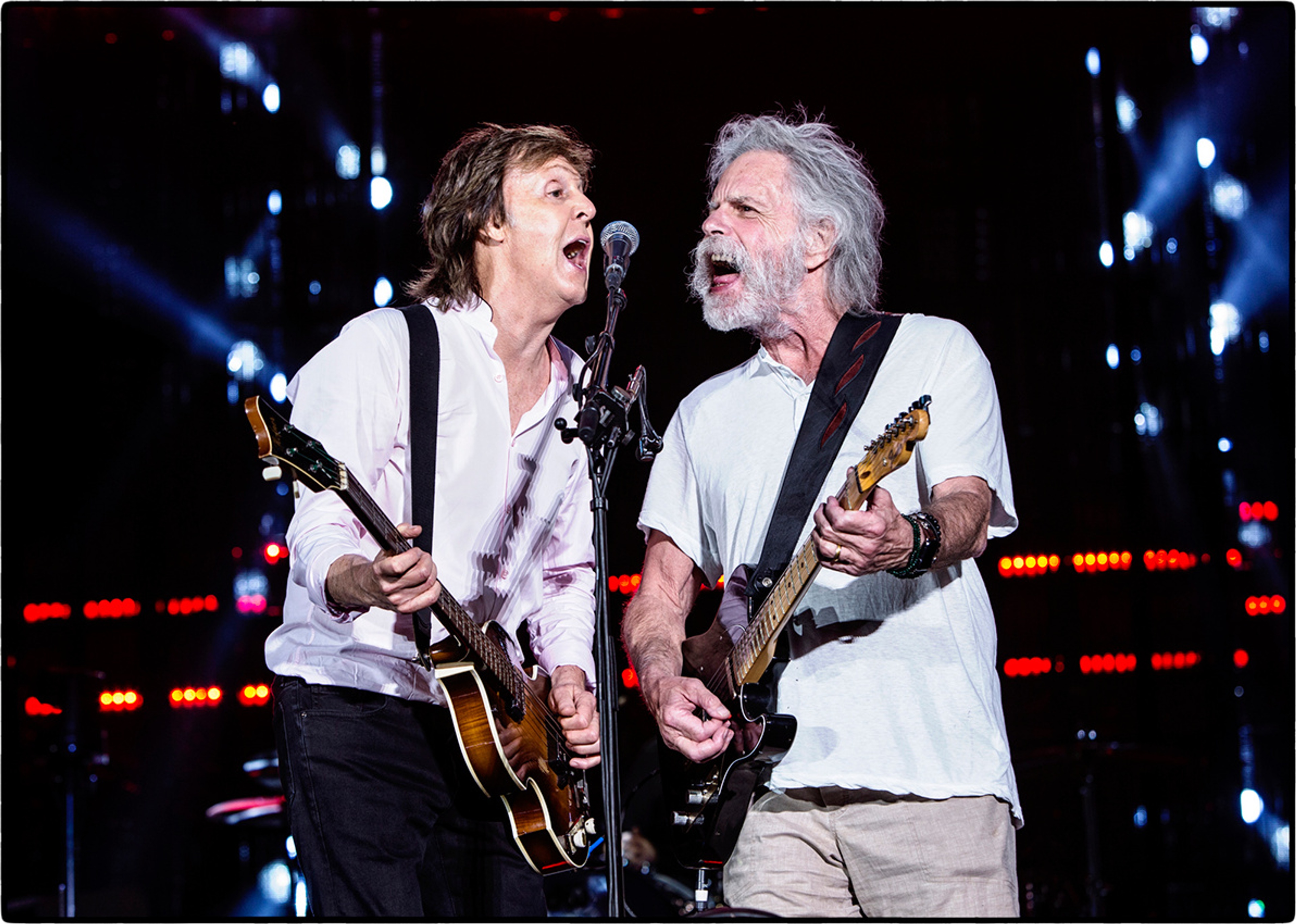 Paul and Bob Weir get it on at Fenway Park, Boston. Grateful Beatle! 
