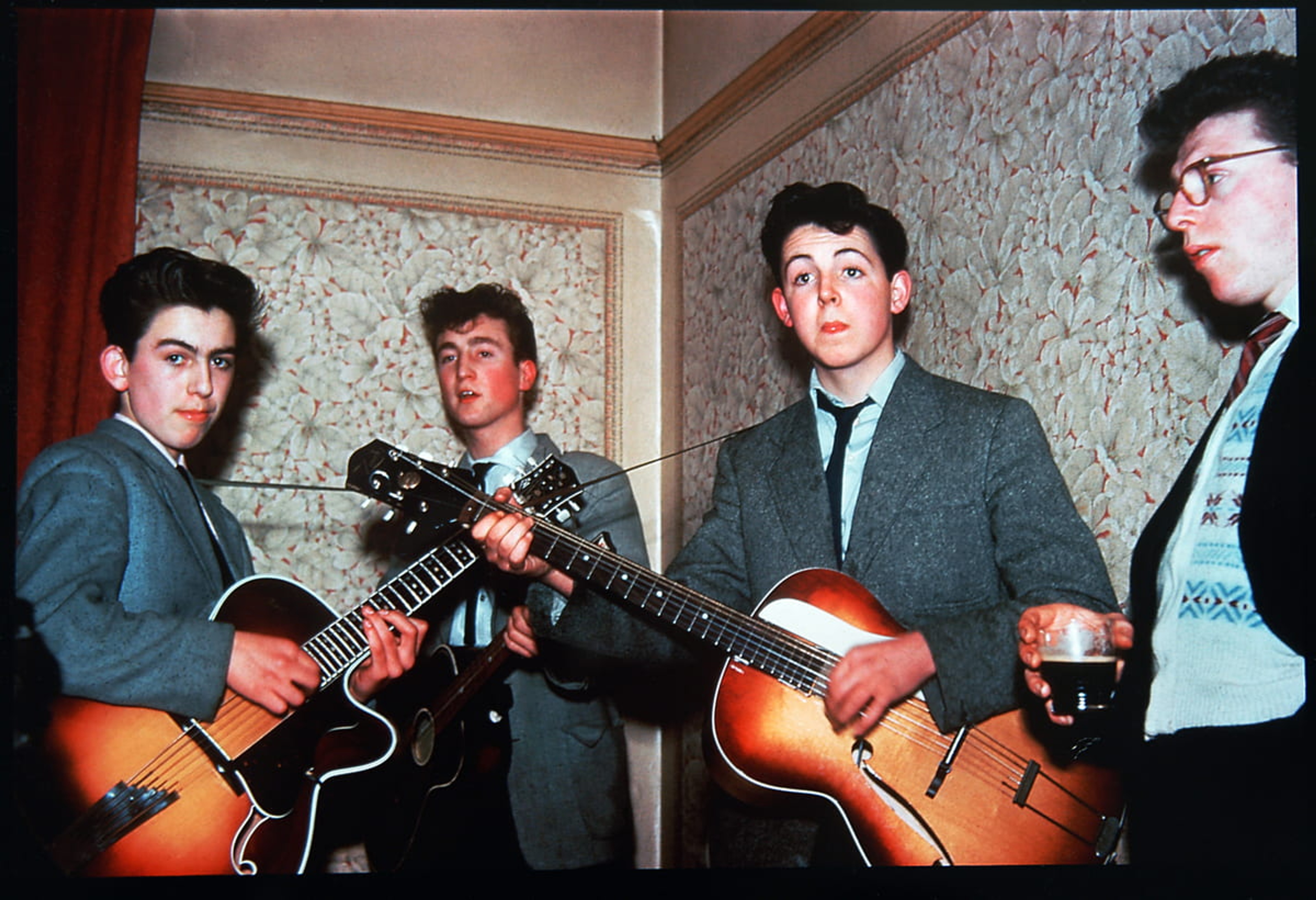 Paul with George Harrison, John Lennon and Dennis Littler in Liverpool, 1958. Photo by Mike McCartney