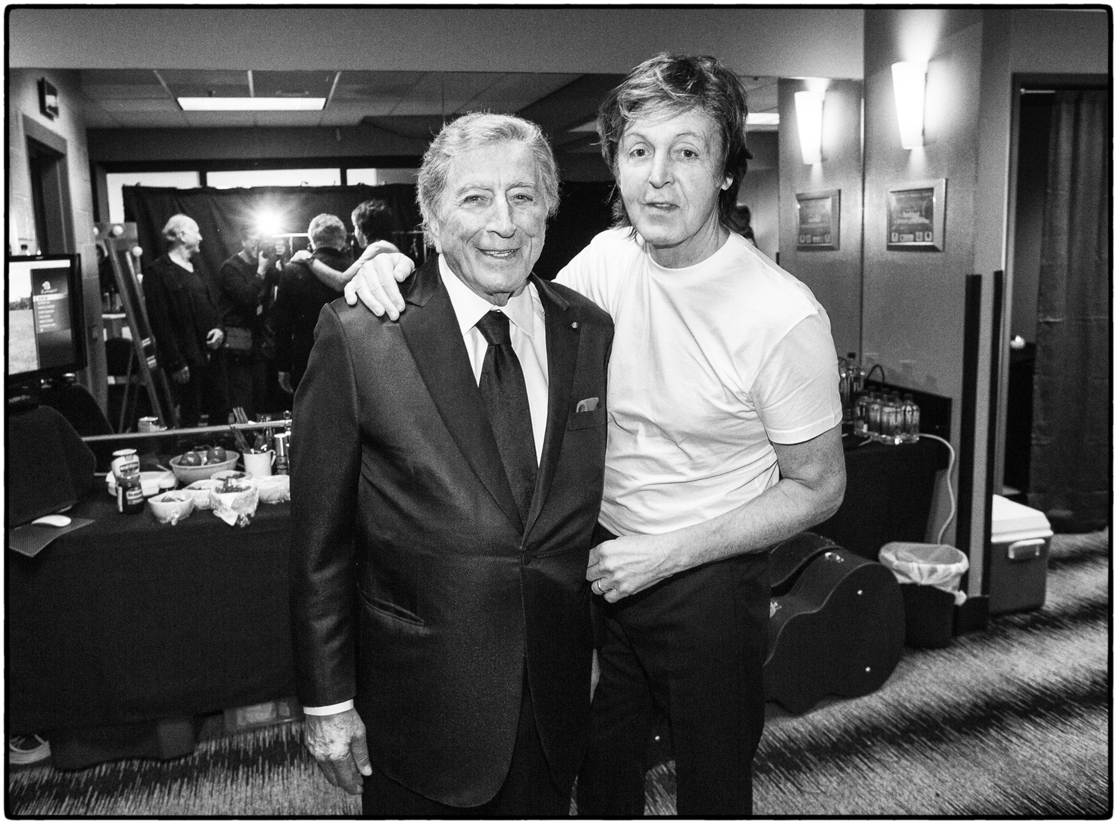 Black and white photo of Tony Bennett and Paul backstage in a dressing room