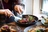 Woman cutting her food