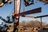 Workers on lifts at steel building construction site