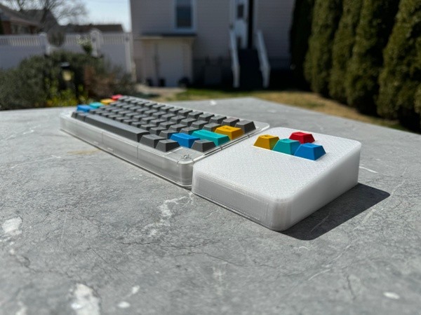 Side profile of macropad next to RAMA Kara keyboard