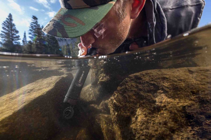 LifeStraw-Peak-Personal_Anthracite-Gray_Lifestyle-Drinking-Hiker-Hat-Side_Adam-Barker.jpg