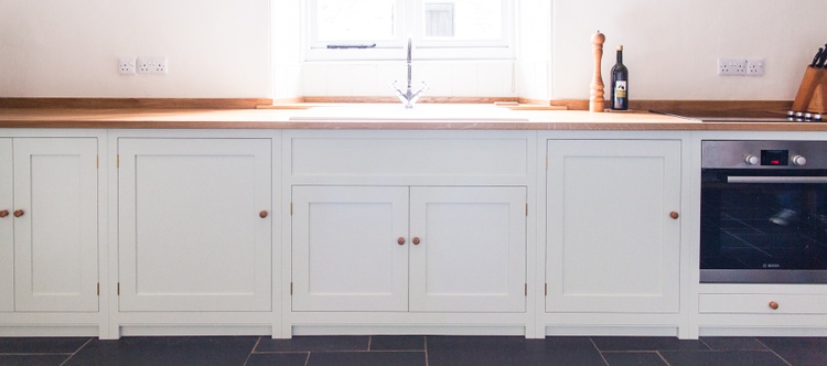 Shaker style kitchen, hand-painted, full-stave Oak worktops, dovetailed draws running on full extension runners