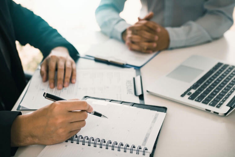 two employees planning for a project together