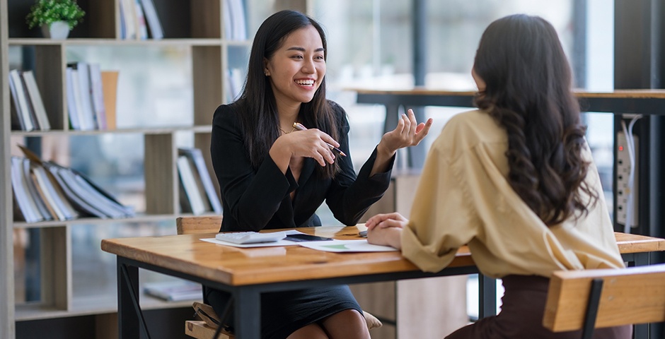 woman describing her goals during interview