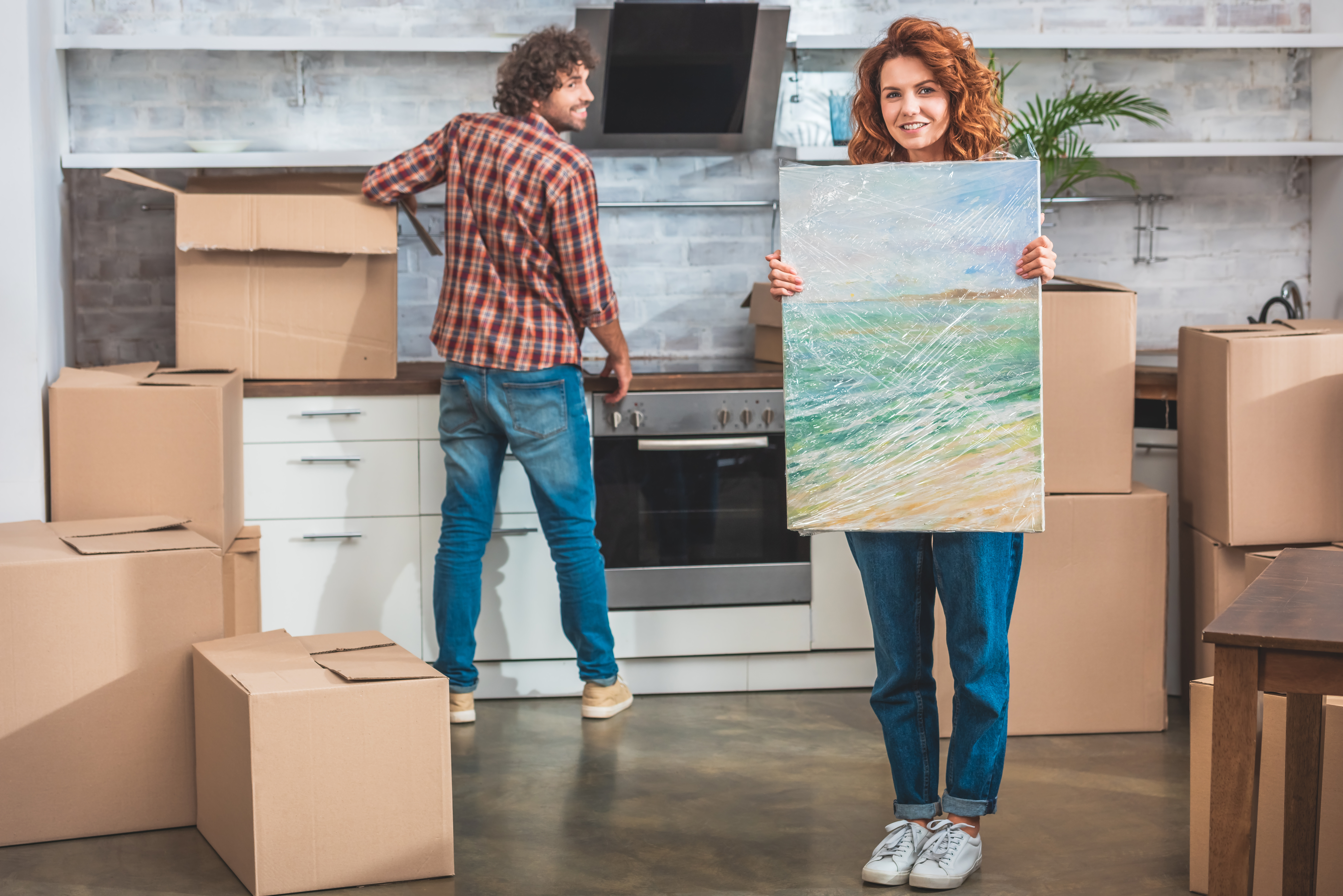 Couple packing a canvas print