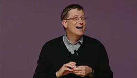 Bill Gates at speaker podium.