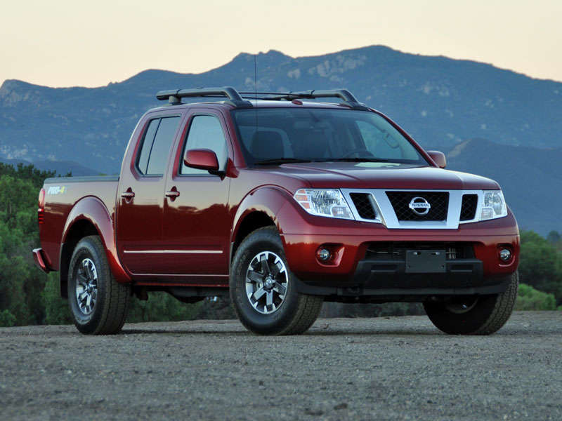 2014 Nissan Frontier Crew Cab 4WD PRO-4X Lava Red Front Quarter Right ・  Photo by Christian Wardlaw