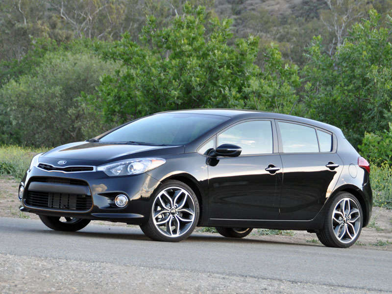 2014 Kia Forte5 SX Aurora Black Front 3/4 Turbocharged Engine ・  Photo by Christian Wardlaw