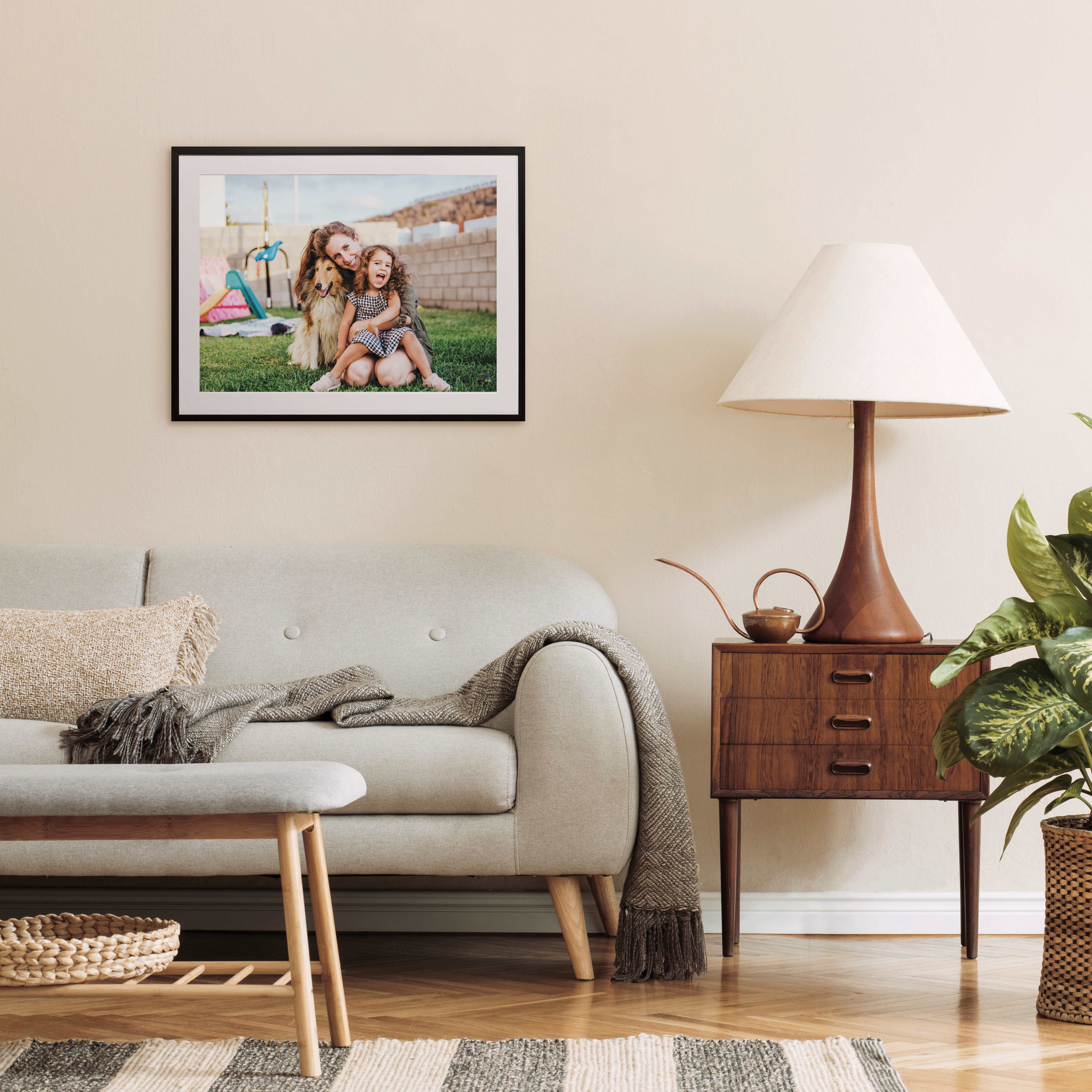 Framed print of family in living room
