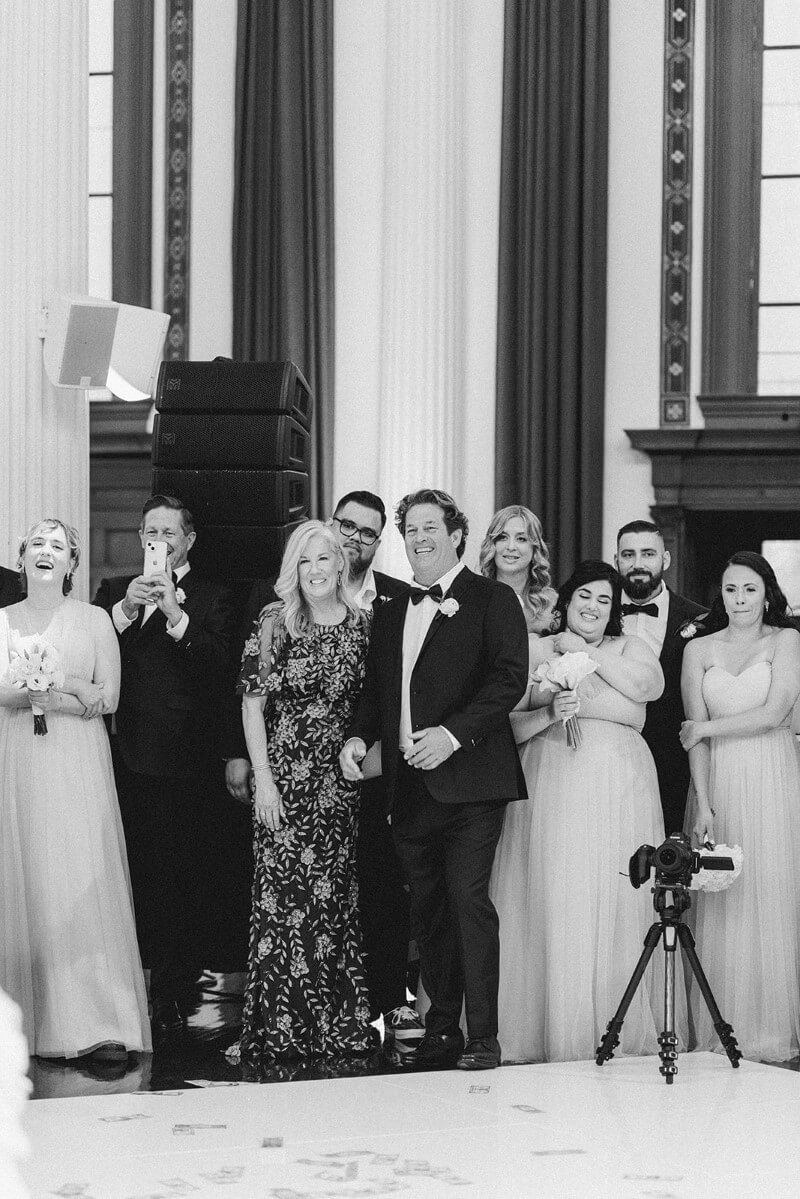 wedding guests watching first dance 