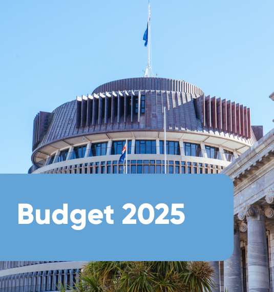 Budget 2025 and picture of the Beehive, Wellington
