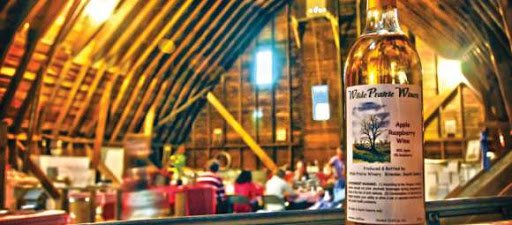 A beautiful body of wine sits inside Wilde Prairie's tasting barn.