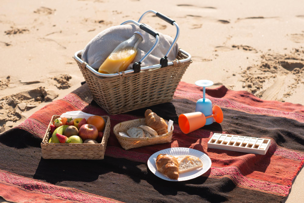 picnic-basket-blanket-beach-basket-food-drinks-blanket-seashore-picnic-food-relaxation-concept.jpg
