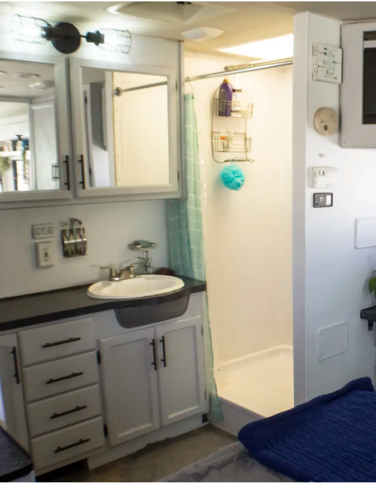 Updating the mirror in your RV's bathroom will add depth to the space.