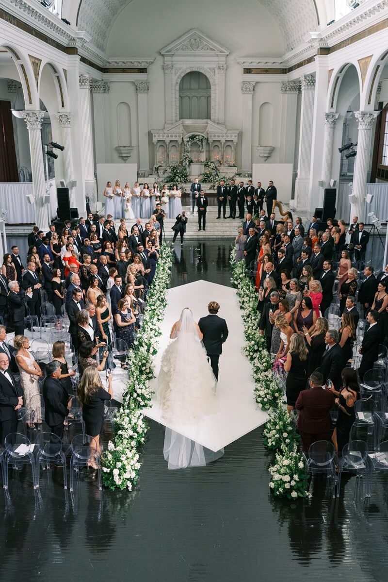 bride and father walking down aisle 