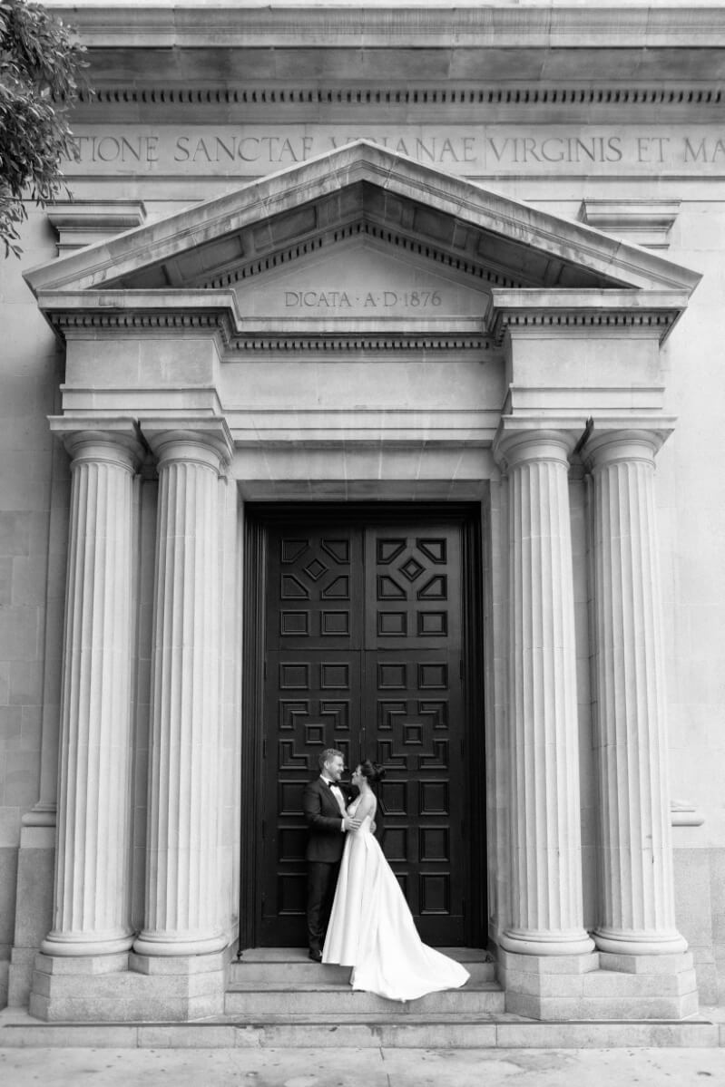 bride and groom hugging